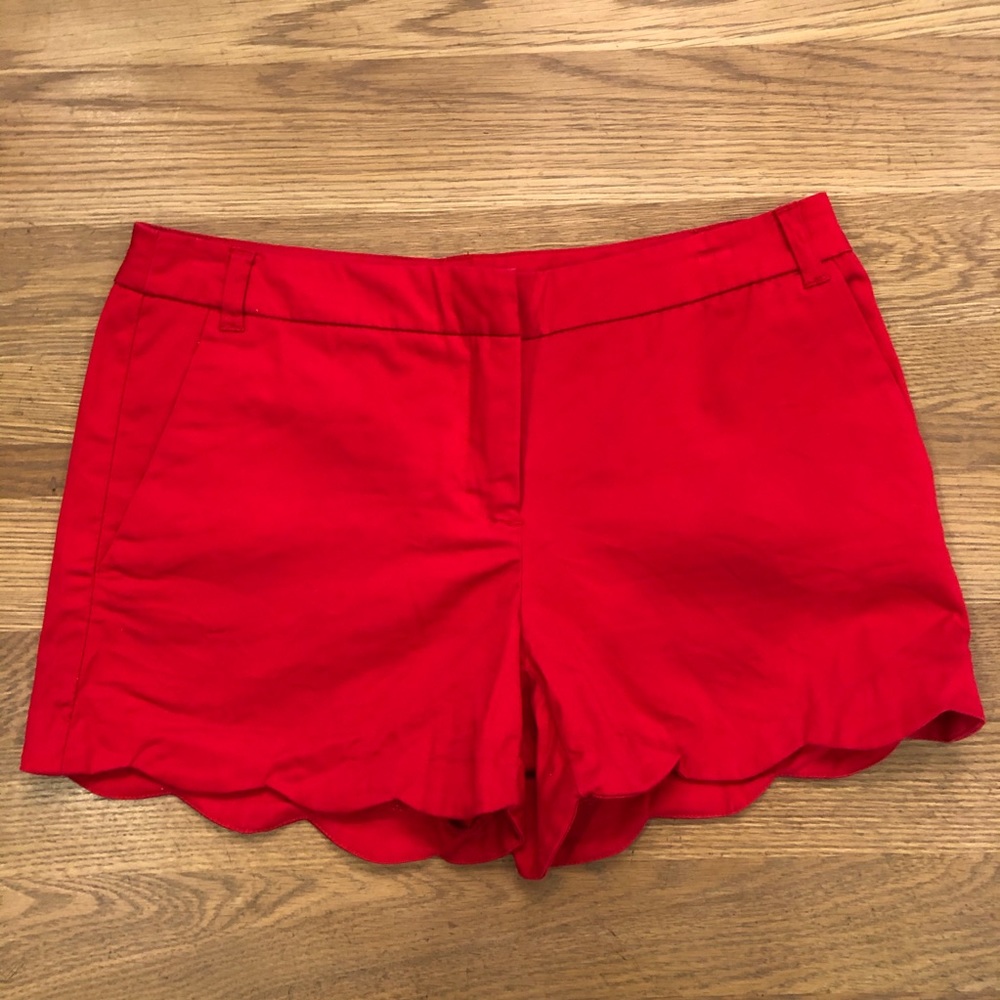 RED DRESSY SCALLOPED HEM SHORTS